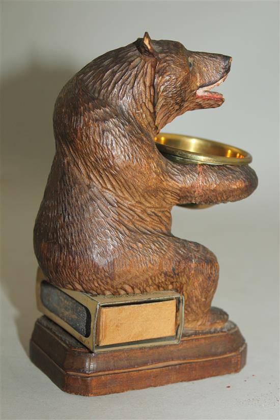 A Black Forest carved bear match tidy, 5.5in.